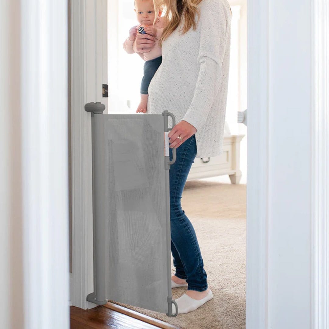 Momcozy Otros accesorios de seguridad Puerta retráctil de seguridad para bebés - Momcozy MCGATEECO140GR