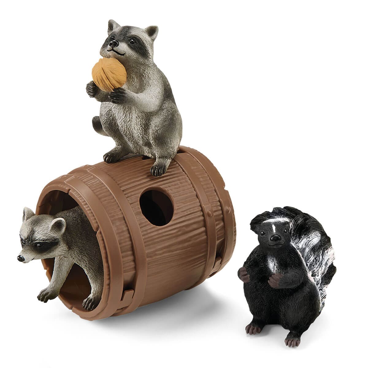 Schleich Animales y Dinosaurios Mapaches y zorrillo divirtiéndose con una nuez - Schleich SCH42596