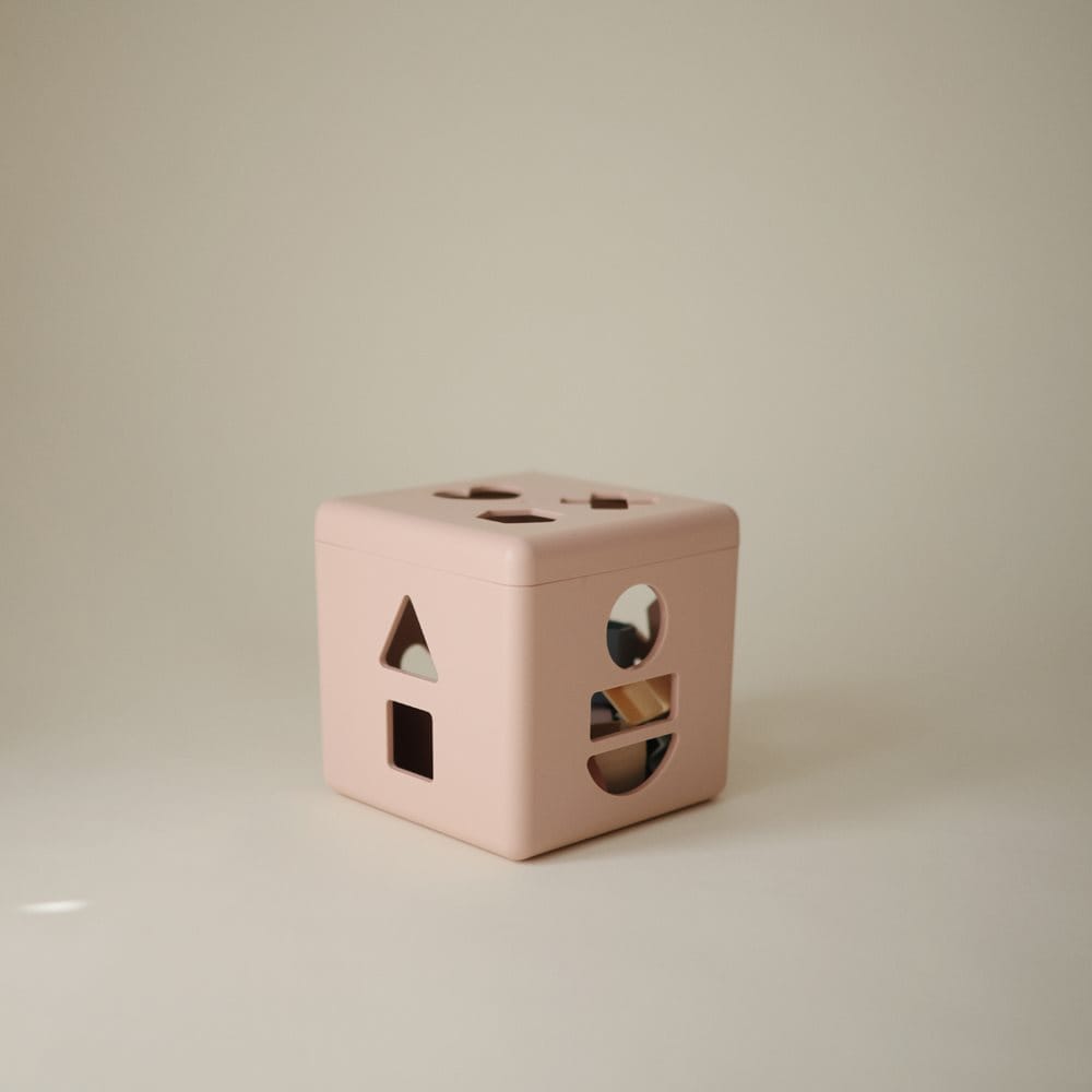 Mushie Puzzles y encajes Caja de clasificación de formas pétalo - Mushie MU102080
