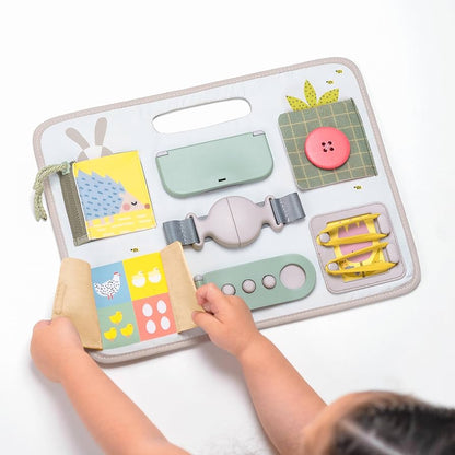 Taf Toys Destreza y Habilidades Tablero de hebillas de actividad 13295